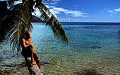 Man, Palm, Bora Bora, Windward Islands French Polynesia, South Pacific