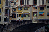 View at the houses on the bridge Ponte Vecchio, Florence, Tuscany, Italy