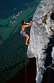 A man freeclimbing at a rock face, Loferer Alp, Salzburger Land, Austria, Europe