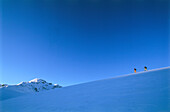 Couple snowshoeing, Serfaus, Tyrol, Austria