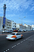 Taxi, houses and minaret, Muscat, Oman, Middle East, Asia