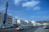 Taxi, houses and minaret, Muscat, Oman, Middle East, Asia