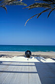 Sandy beach and ocean under blue sky, The Chedi Hotel, Muscat, Oman, Middle East, Asia