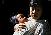 Sister with baby brother, Luzon Island- Philippines