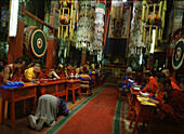 Gandan Chiid monastery, monks and praying women, Ulan Bator, Mongolia Asia