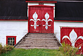 Barn painted with Quebec Lilies, near Beaupré Quebec, Canada