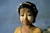 Girl with Thanaka make up, , Rangoon, Myanmar Asia