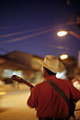 Guitar player at night, Creel, Chihuahua, Mexico