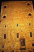 Historical facede, side building of Torre Lamberti, Verona, Italy