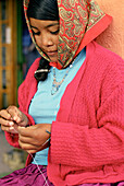 Young woman sewing, Divisadero, Chihuahua, Mexico