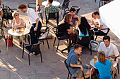 People sitting at tables of Moritz Bastei, Leipzig, Saxony, Germany