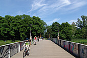 Cyclists at Ratsholz Park, Leipzig, Saxony, Germany, Europe