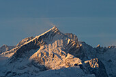 Snowy mountain peak in sunlight, Alpspitze, Garmisch Partenkirchen, Germany