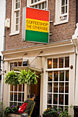 Man, Coffeeshop, Man looking inside a Coffeeshop, rear view, Amsterdam, Holland, Netherlands