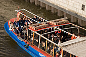 Harbour tour with a barge, People having a harbour tour with a barge, Hamburg, Germany