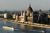 Parliament and Danube river, View over the Danube with boats to the Parliament, Pest, Budapest, Hungary