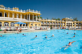 People in open-air swimming pool, People swimming in open-air pool of Szechenyi-Baths, Pest, Budapest, Hungary