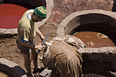 Worker in tanners quarter, Chouara, Fes, Morocco