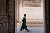 Moslem passing, Medersa Ben Youssef, Marrakech