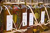 Different bottle with wine and oil of a souvenir shop, Zia, Kos, Greece