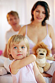 Young family in bedroom