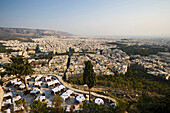 View from the Lykavittos Hill over a restaurant to the ocean of houses of the town, Athens, Athens-Piraeus, Greece