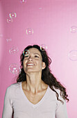 Woman with soap bubbles, Portrait