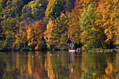 Hut and autumn colors at Lake Hinterbrühler See near Munich, Bavaria, Germany