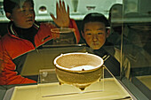 interior,school kids study ancient ceramic bowl, am People's Square, Renmin Dadao, Chinas, exhibitions, Ancient Chinese Bronzes Gallery, Ancient Chinese Sculpture, Ceramics, painting, calligraphy, jade gallery, coin, ming furniture