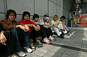 teenagers,Jungs, cool, sitting, waiting, Shopping Mall, young people, fashion, new generation, city youngsters
