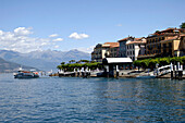 An excursion boat driving across the lake, Bellagio, Lago di Como, Lombardia, Italy