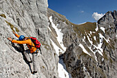 Climber moving up on Wilder Kaiser, Tyrol, Austria
