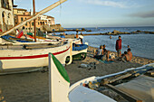 Costa Brava, people bathing on the beach at Callela, Costa Brava, Catalonia Spain