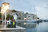 Restaurant with harbour and boats, Valun, Cres Island, Croatia