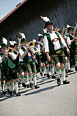 Band in traditional bavarian clothes,during a festival on 1st of mai, Münsing, Bavaria, Germany