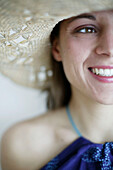 Laughing girl with Straw hat