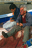 Fishermen at the harbour San Jose,Cabo de Gata,Province Almeria,Andalusia,Spain