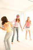 Teenage girls (14-16) playing Blind Man's Bluff