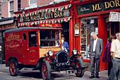 Oldtimer in front of Ml Dore shop on Parliament Street, Kilkenny, County Kilkenny, Ireland