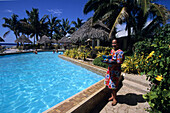 Cocktail Waitress and Swimming Pool,The Edgewater Resort, Rarotonga, Cook Islands
