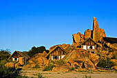 The bungalows and prominent rocks of the Canon Lodge, Gondwana Canon Park, Fish river canyon. Southern Namibia. Africa.