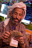 Man counting money, Sana'a, Yemen