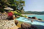 Vacationers bathing in a swimming pool with ocean view, Mom Tri's Villa Royal Resort, Hat Kata Yai, Ao Kata Yai, Phuket, Thailand, after the tsunami