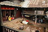People at the courtyard of the Xixiang Chi monastery, Emei Shan, Sichuan province, China, Asia