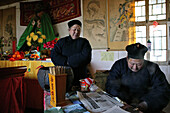 A monk and a nun at the monastery at Golden Lock Pass, Hua Shan, Shaanxi province, China, Asia