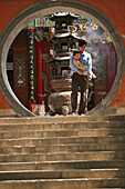 moongate, in monastery wall, Hua Shan, Shaanxi province, Taoist mountain, China, Asia