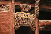 Artful carvings at the roof beam of a house at the village Hongcun, Huang Shan, China, Asia