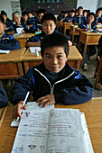 pupils in classroom at one of many new Kung Fu schools in Dengfeng, near Shaolin, Song Shan, Henan province, China, Asia