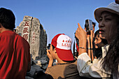 Chinese tourists crowd the summit, for the sunrise, stall sellers, Tai Shan, Shandong province, Taishan, Mount Tai, World Heritage, UNESCO, China, Asia