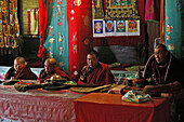 prayer ceremony Pusa Ding monastery, yellow cap monks celebrate, winter,  Xiantong Monastery, Wutai Shan, Five Terrace Mountain, Buddhist Centre, town of Taihuai, Shanxi province, China, Asia